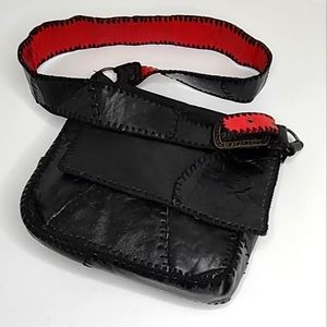 Vintage 70's whopstitched red and black textured crossbody purse.